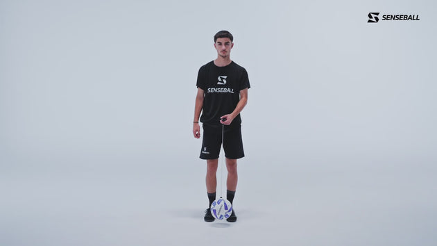 Young player practicing two-footed drill with SenseBall football kick trainer