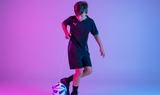 Children practicing football with the SenseBall all-level kick trainer